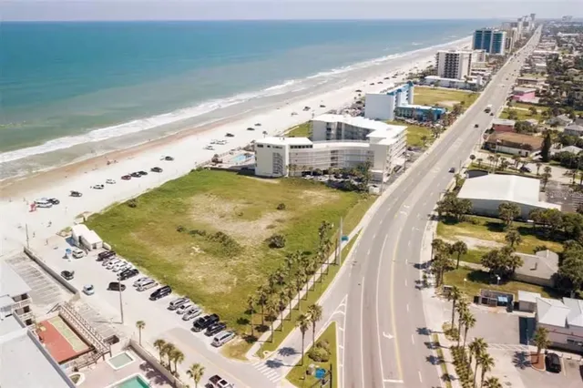 a room with furniture mirror and fireplace