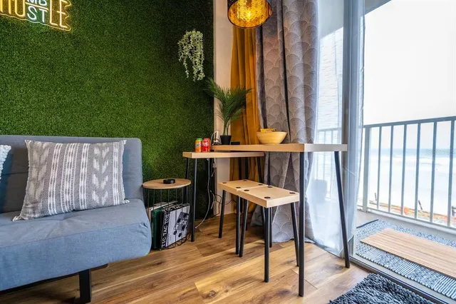 a living room with furniture and a window