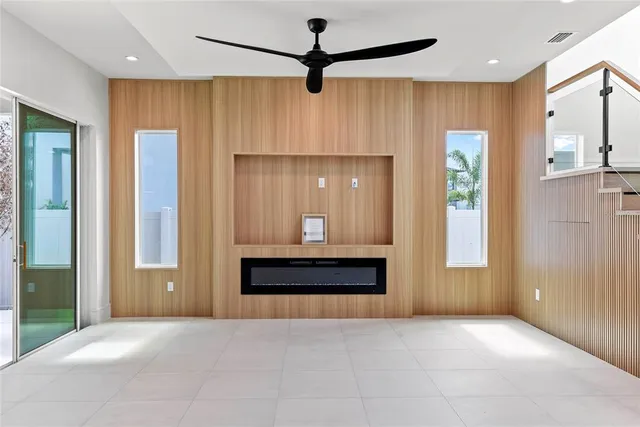 a large room with windows and closet