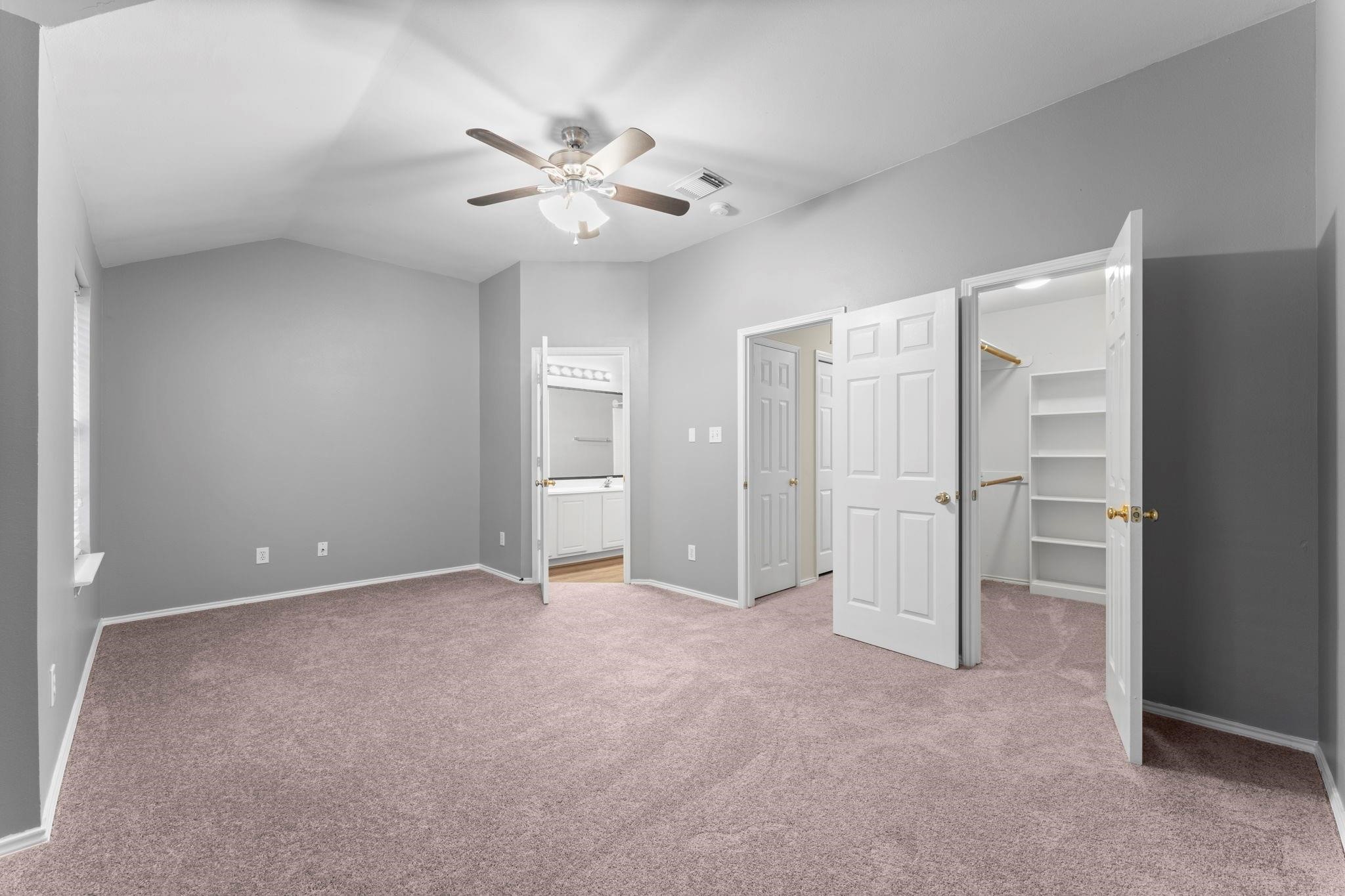 7 Verbena Bend Place Spring, TX 77382 - Photo 15 of 33 a view of an empty room with a fan