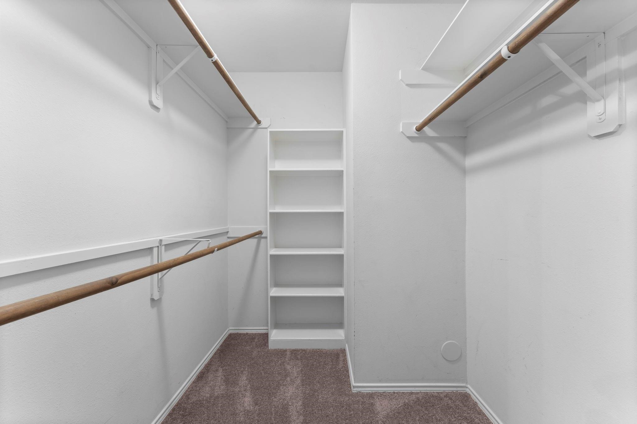 7 Verbena Bend Place Spring, TX 77382 - Photo 16 of 33 a view of an empty walk in closet