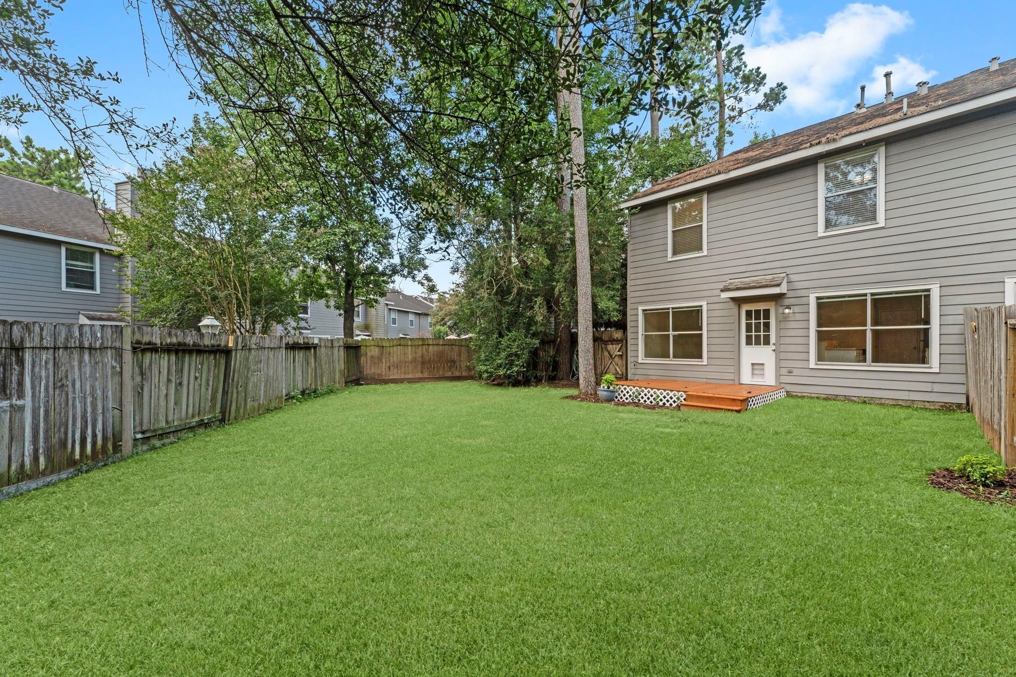 7 Verbena Bend Place Spring, TX 77382 - Photo 25 of 33 a front view of a house with a garden