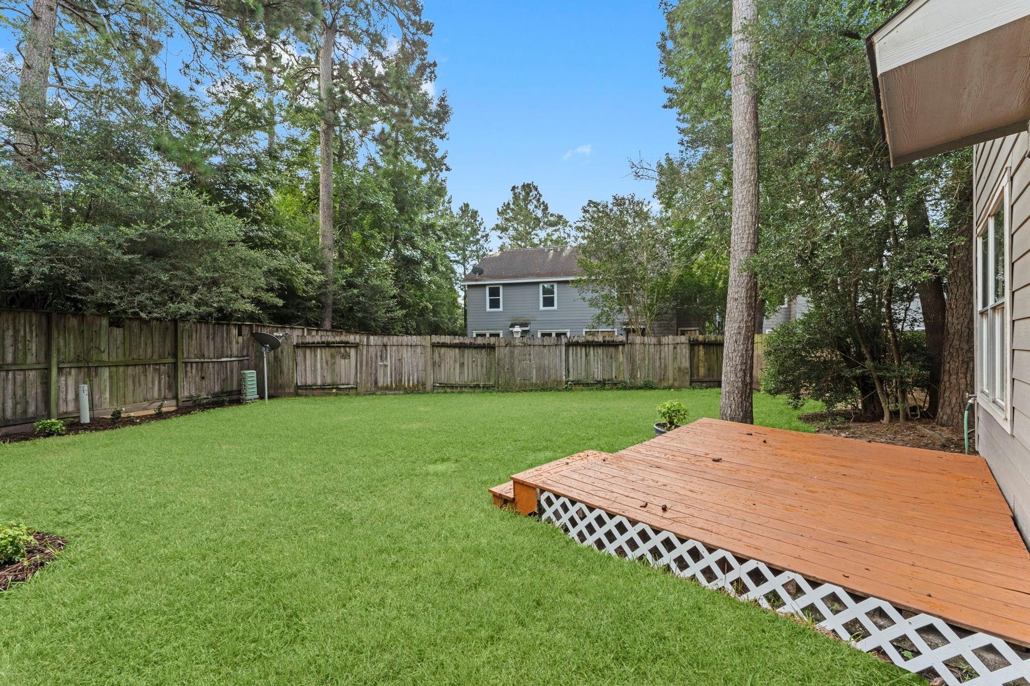 7 Verbena Bend Place Spring, TX 77382 - Photo 27 of 33 a view of a house with backyard and garden