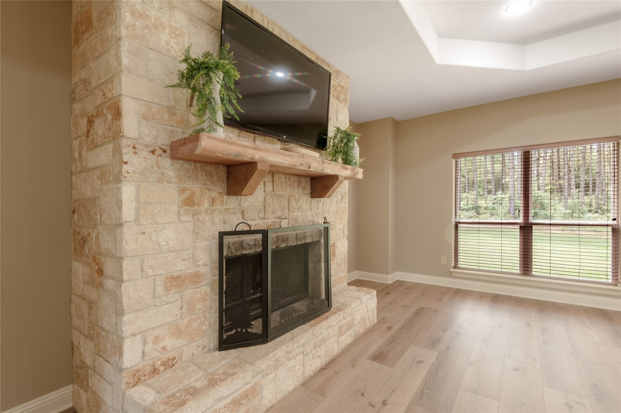 3134 Nursery Road Livingston, TX 77351 - Photo 12 of 50 Custom built mantle with plugs for a TV.