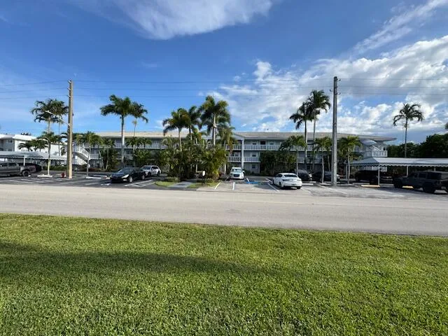 a view of street with tall buildings
