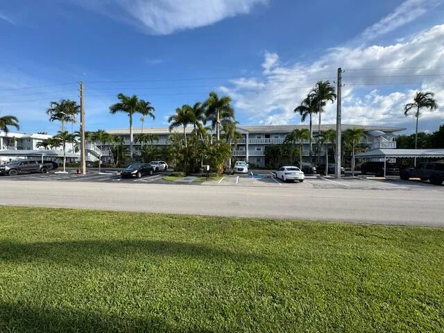 a view of street with tall buildings