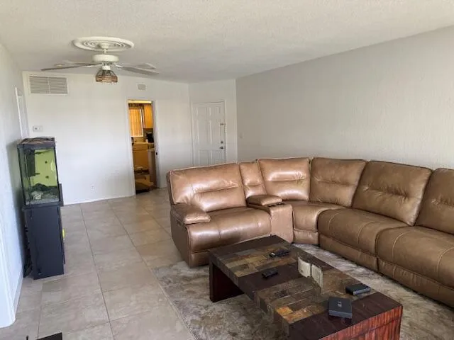 a living room with furniture and a couch