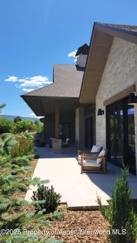 a view of kitchen with furniture and wooden floor