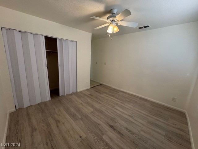 132 West Victory Road Henderson, NV 89015 - Photo 20 of 28 Large master bedroom with ceiling fan and double door closet.