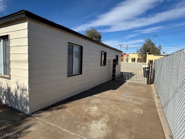 132 West Victory Road Henderson, NV 89015 - Photo 6 of 28 East side yard with RV gate.