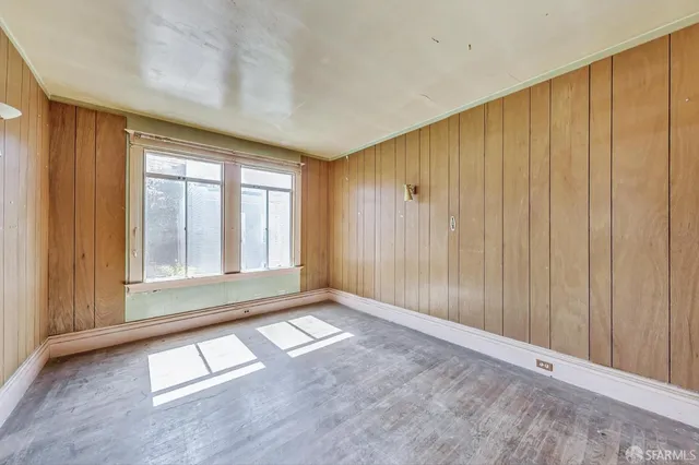 an empty room with windows