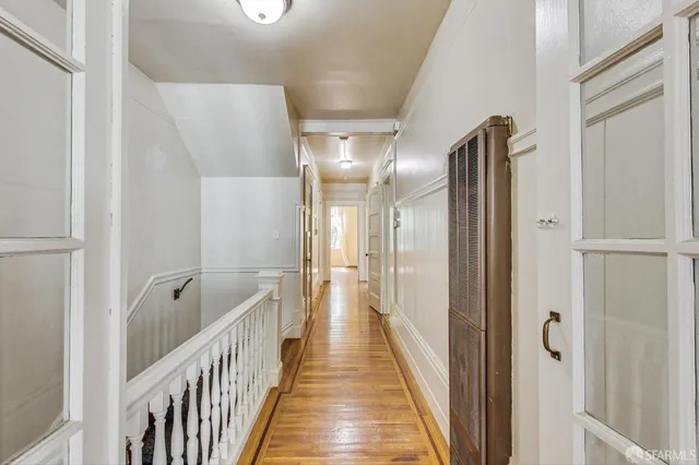 a view of a bathroom from the hallway