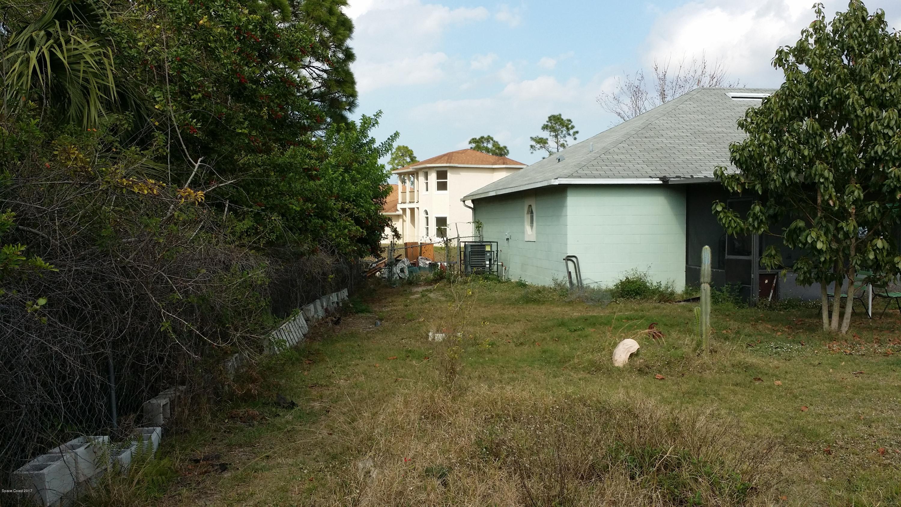 396 Hanford Road Southwest Palm Bay, FL 32908 - Photo 15 of 18 Back Left Side
