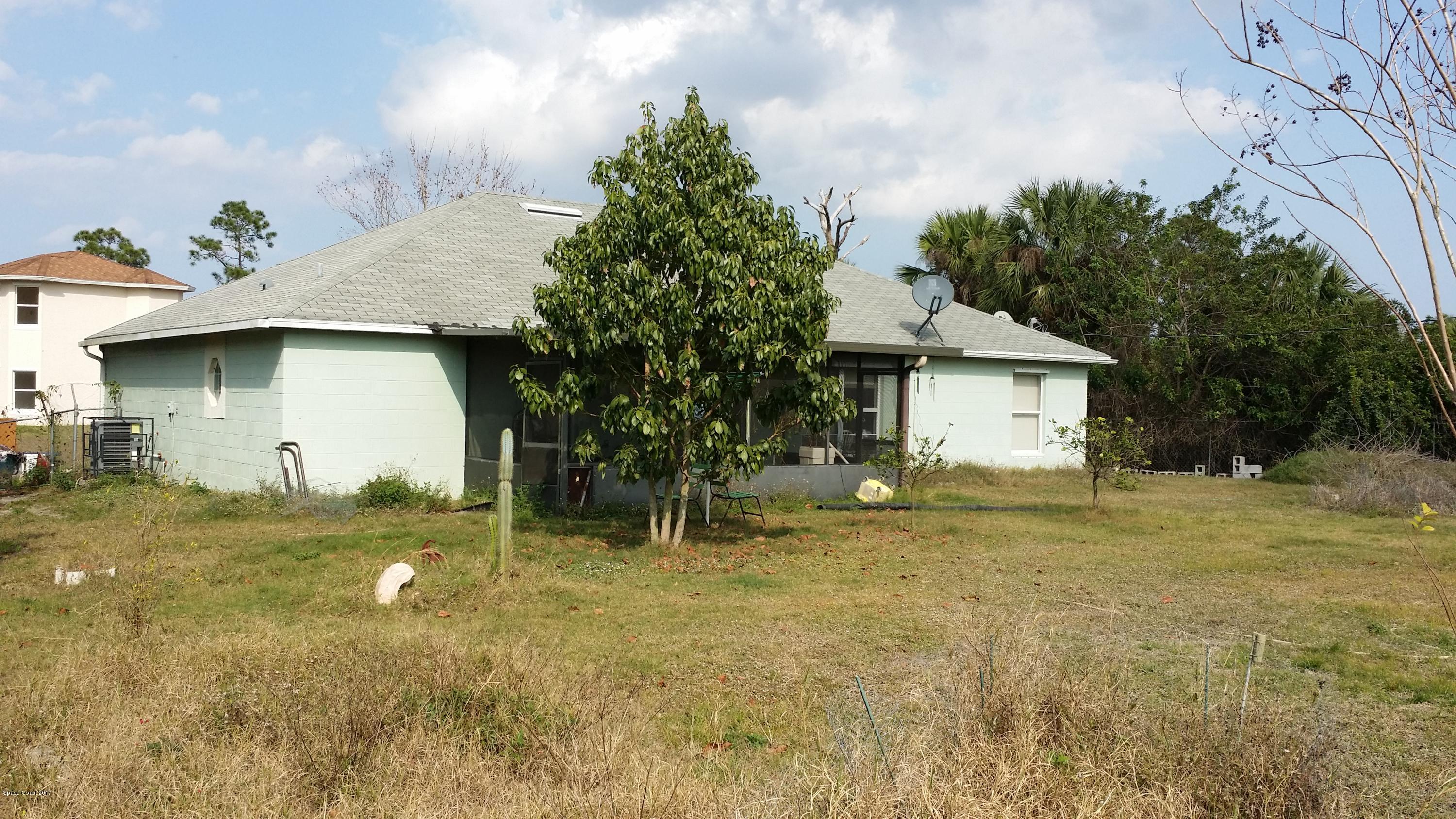 396 Hanford Road Southwest Palm Bay, FL 32908 - Photo 17 of 18 Back view of House