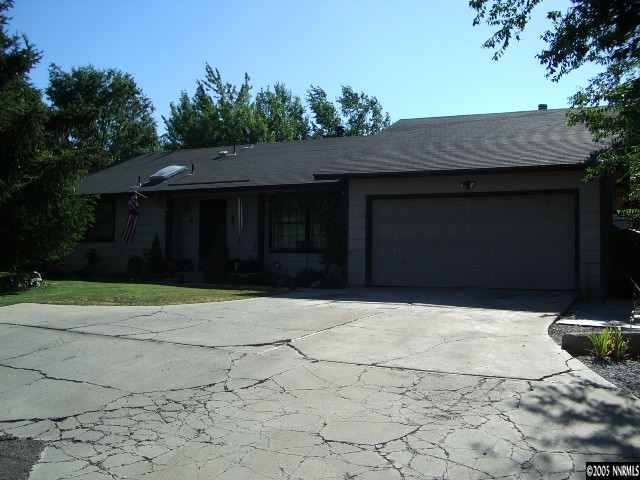 3872 West 7th Street Reno, NV 89503 - Photo 1 of 9 a house with tree in front of it