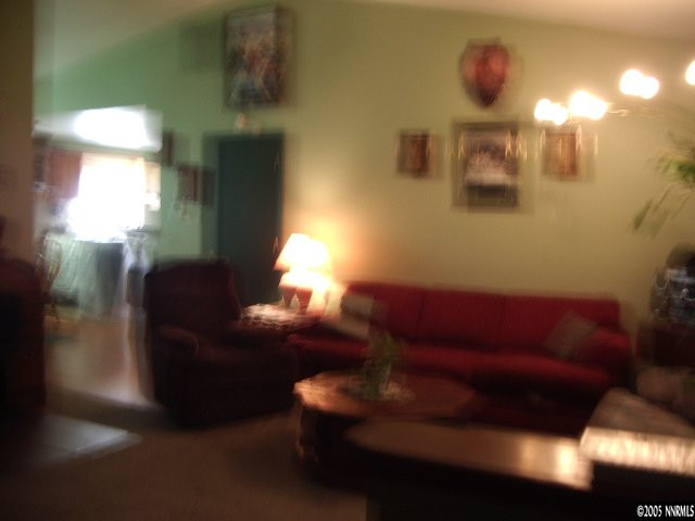 3872 West 7th Street Reno, NV 89503 - Photo 3 of 9 a living room with furniture and a fireplace