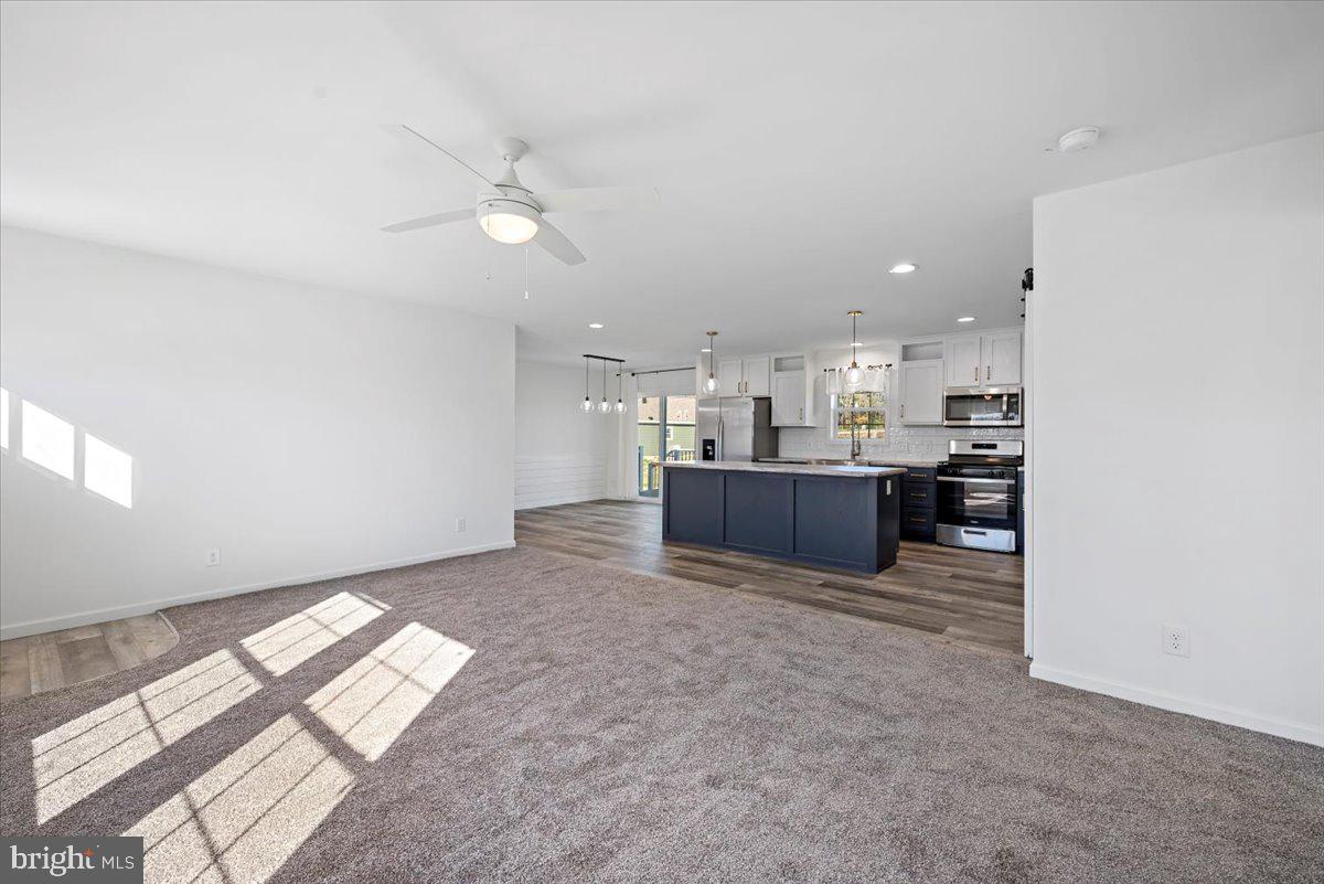 1410 Heytesbury Road Walnutport, PA 18088 - Photo 8 of 37 Bright and airy open-concept living.