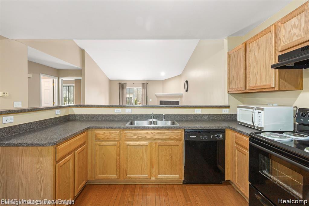 263 Wood Point, Unit 24 Howell, MI 48843 - Photo 2 of 15 The kitchen is the heart of this condo!