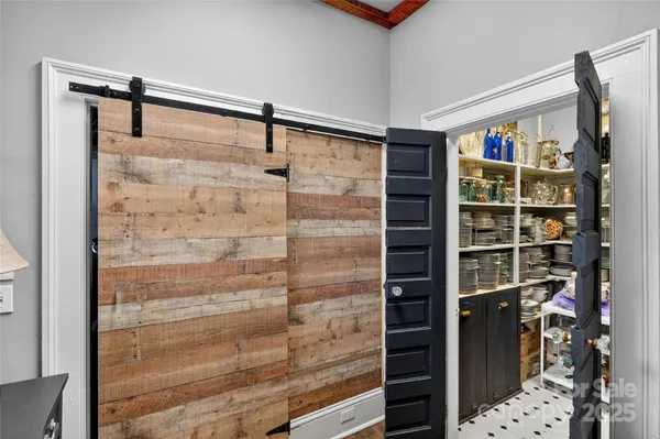 a bathroom with a shower and a mirror
