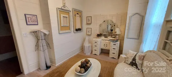 view of a bedroom with bed and furniture