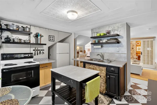 a spacious bedroom with a bed and window