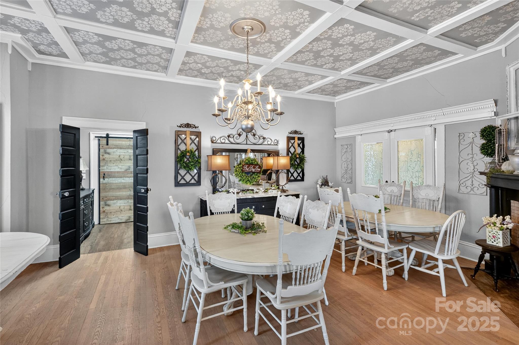 178 South Caldwell Street Brevard, NC 28712 - Photo 8 of 40 a view of a dining room with furniture window and wooden floor