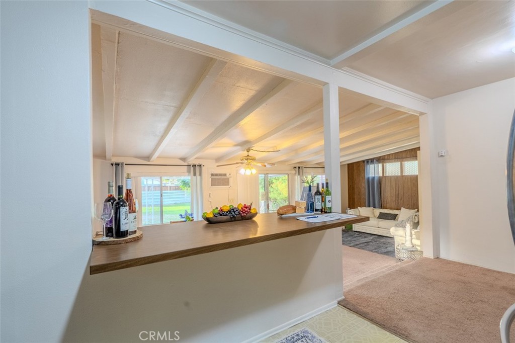 7859 Sycamore Avenue Riverside, CA 92504 - Photo 11 of 31 a large room with a large window and furniture