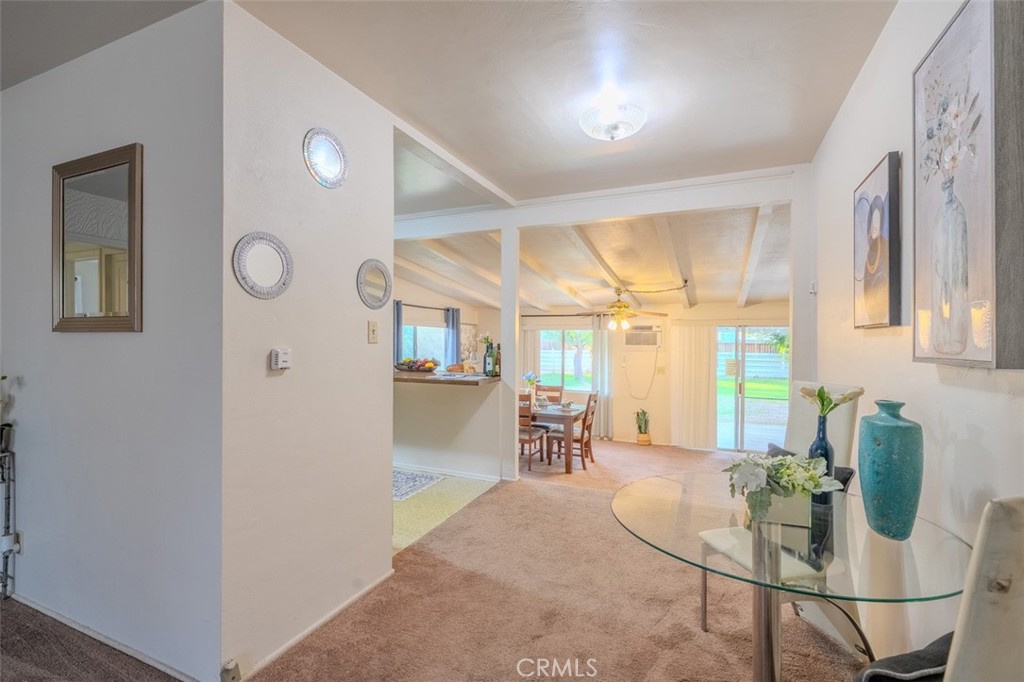 7859 Sycamore Avenue Riverside, CA 92504 - Photo 7 of 31 a dining room with furniture and window