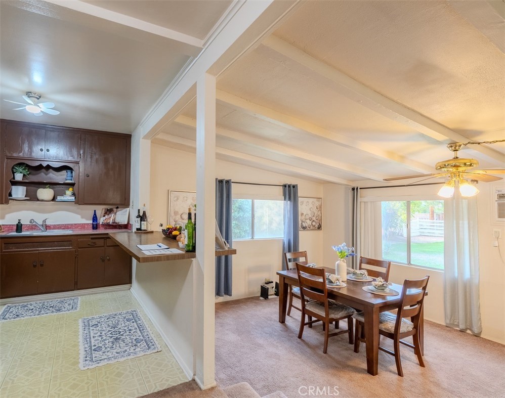 7859 Sycamore Avenue Riverside, CA 92504 - Photo 9 of 31 a view of a dining room with furniture