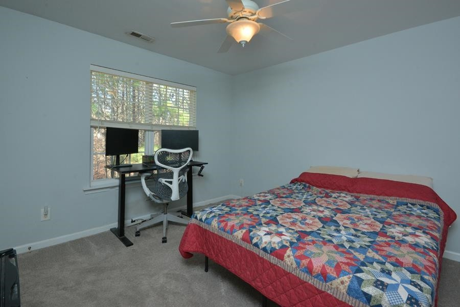 8249 City Loft Court Raleigh, NC 27613 - Photo 24 of 28 Second Bedroom