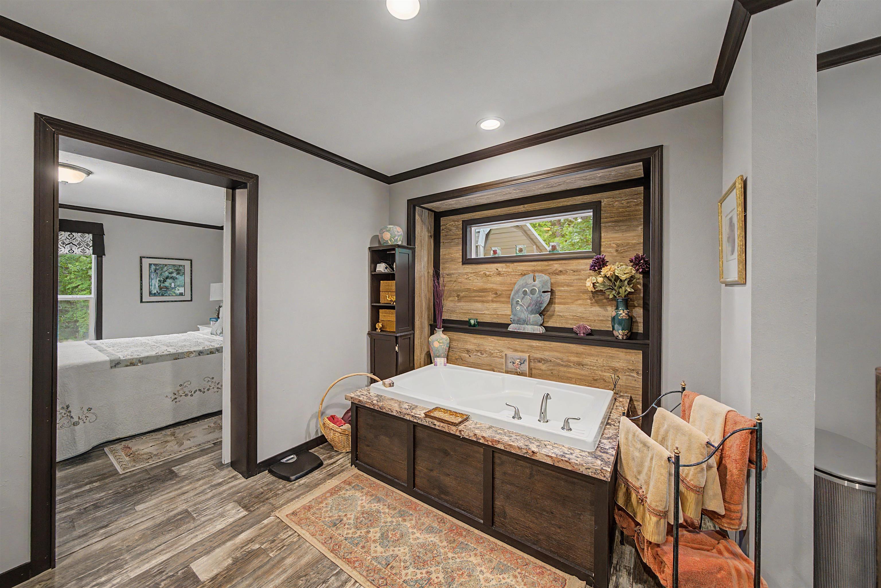 162 Matlock Road Ramer, TN 38367 - Photo 28 of 29 a room with a bed and a view of bathroom
