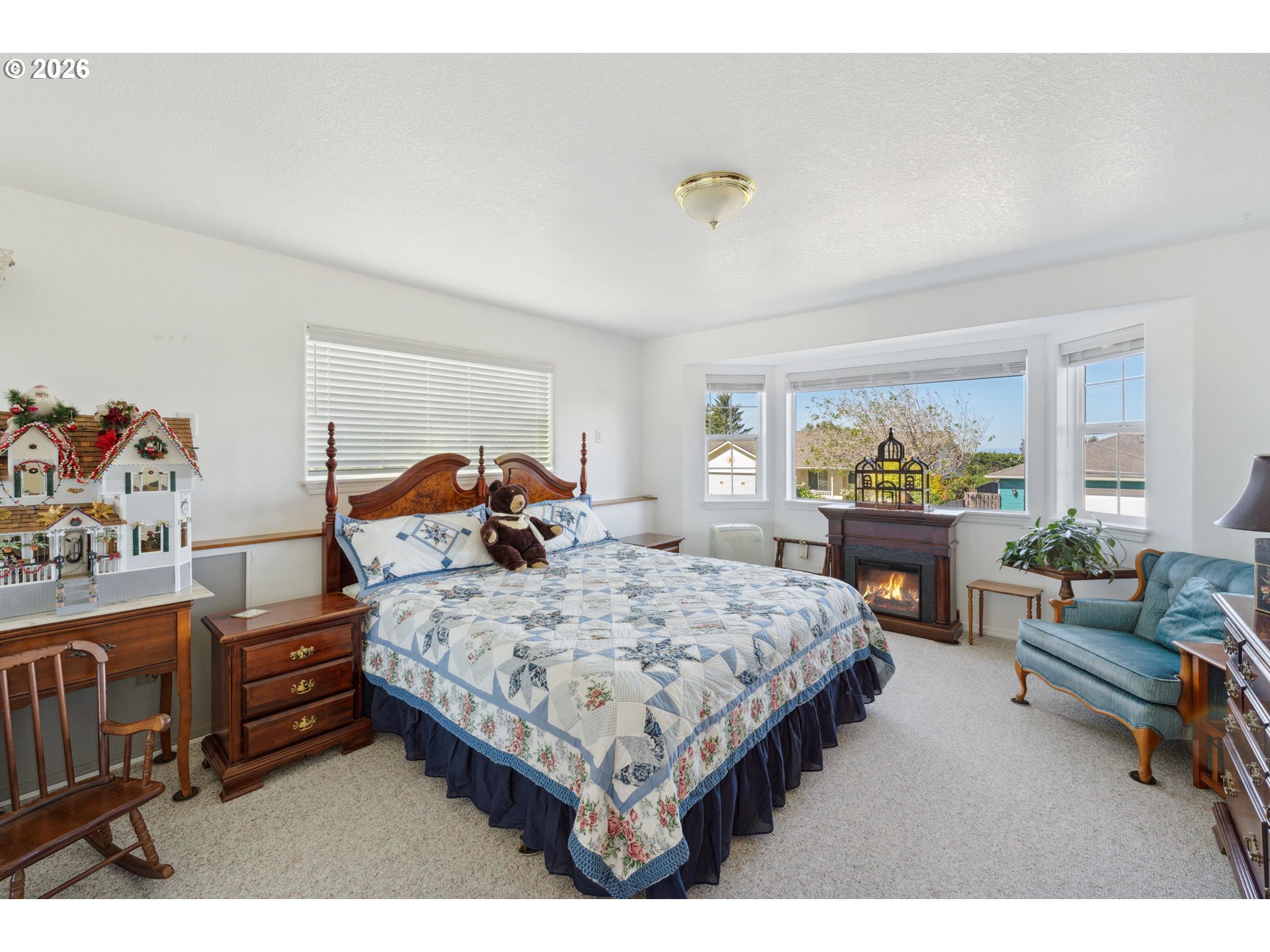 805 Lisa Place Coos Bay, OR 97420 - Photo 23 of 47 a bedroom with a bed and furniture