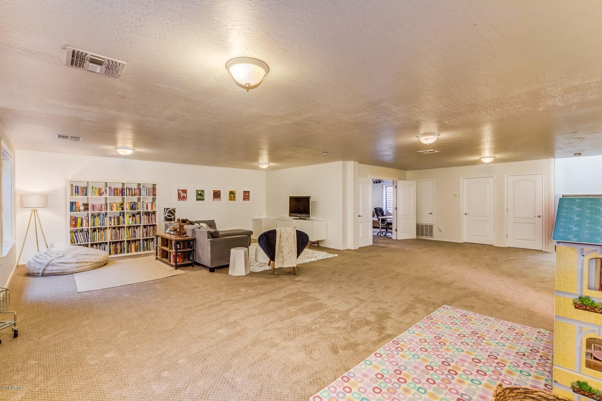 4186 East Blue Sage Road Gilbert, AZ 85297 - Photo 26 of 40 View of Basement Bonus & Theater Room