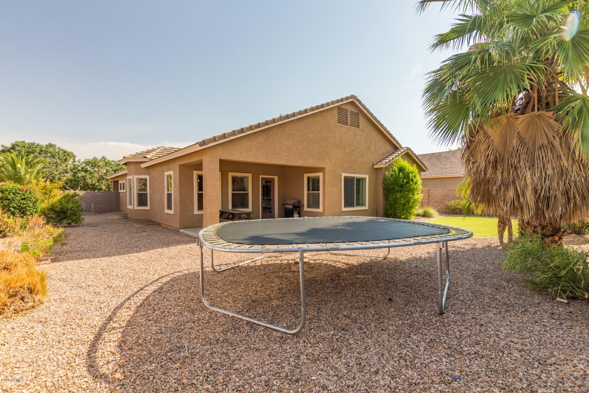 4186 East Blue Sage Road Gilbert, AZ 85297 - Photo 34 of 40 Pool sized backyard with large side yard