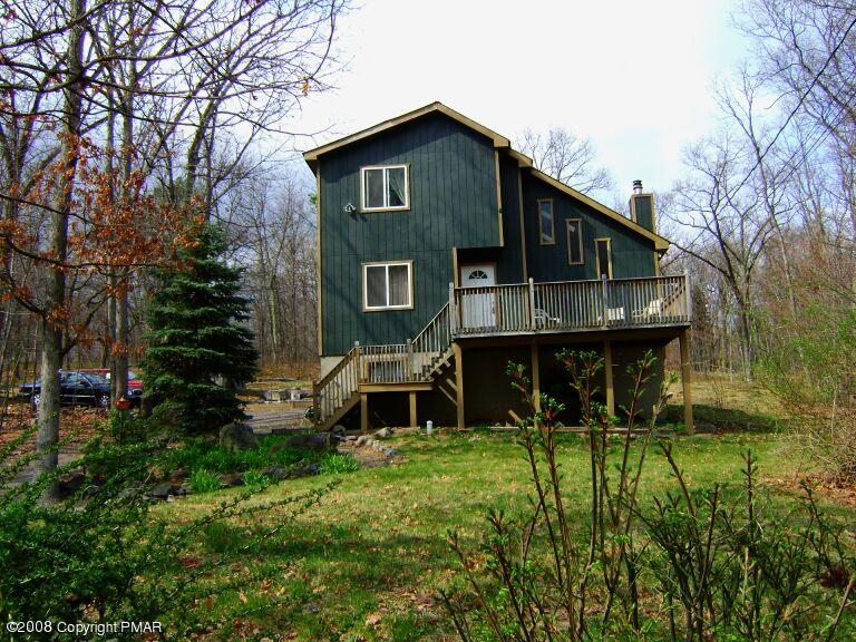112 Bromley Road Henryville, PA 18332 - Photo 1 of 13 a front view of a house with a yard