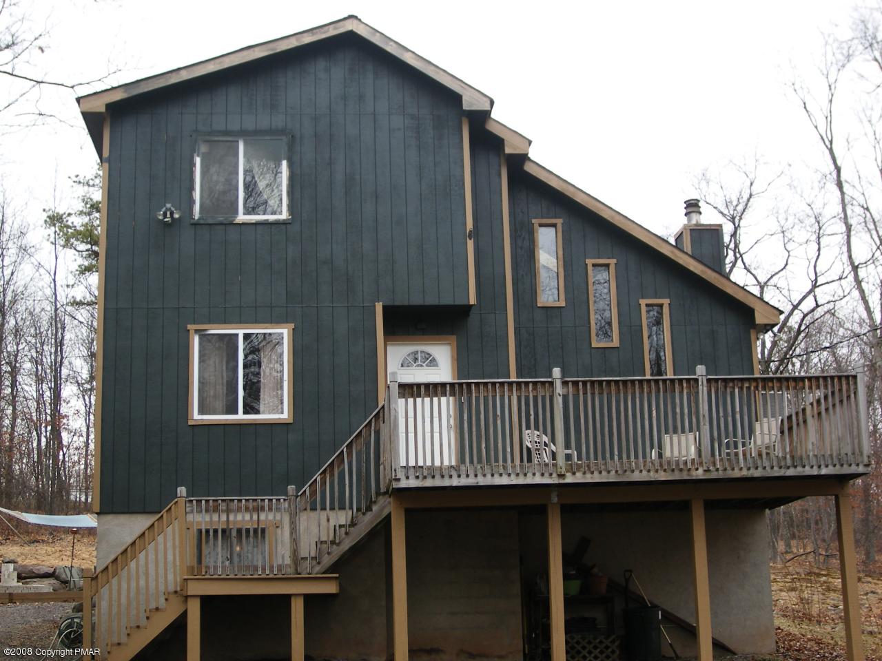 112 Bromley Road Henryville, PA 18332 - Photo 2 of 13 a view of a house with a deck