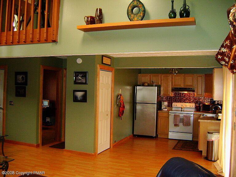 112 Bromley Road Henryville, PA 18332 - Photo 8 of 13 a kitchen with stainless steel appliances granite countertop a refrigerator and a sink