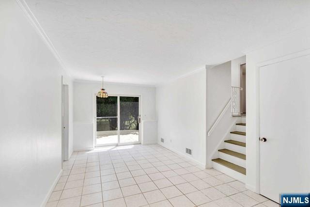 516 Knickerbocker Road Cresskill, NJ 07626 - Photo 21 of 31 a view of an entryway with stairs