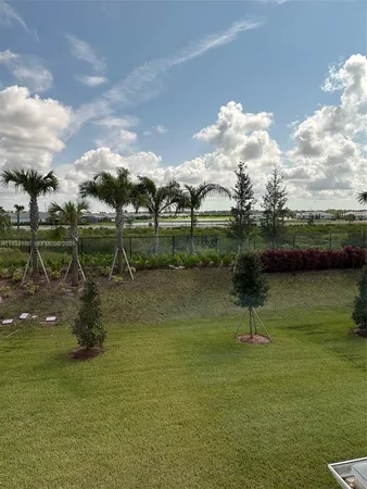 a view of a porch and garden