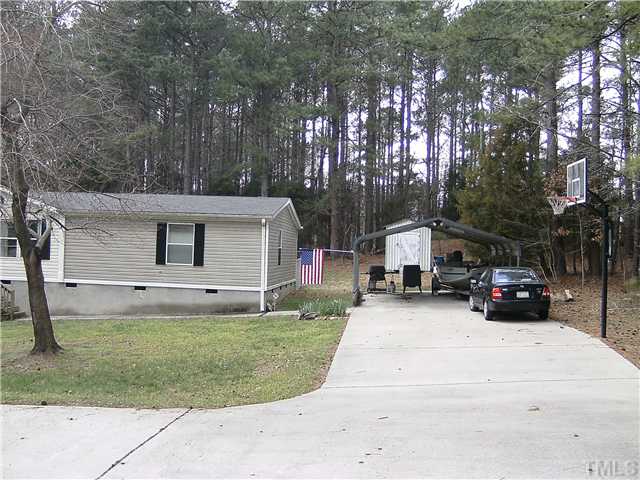 460 Club Pond Road Henderson, NC 27537 - Photo 12 of 14 2-car carport and outbuilding