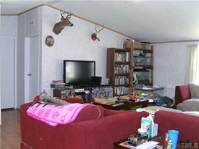 460 Club Pond Road Henderson, NC 27537 - Photo 4 of 14 Another view of living room