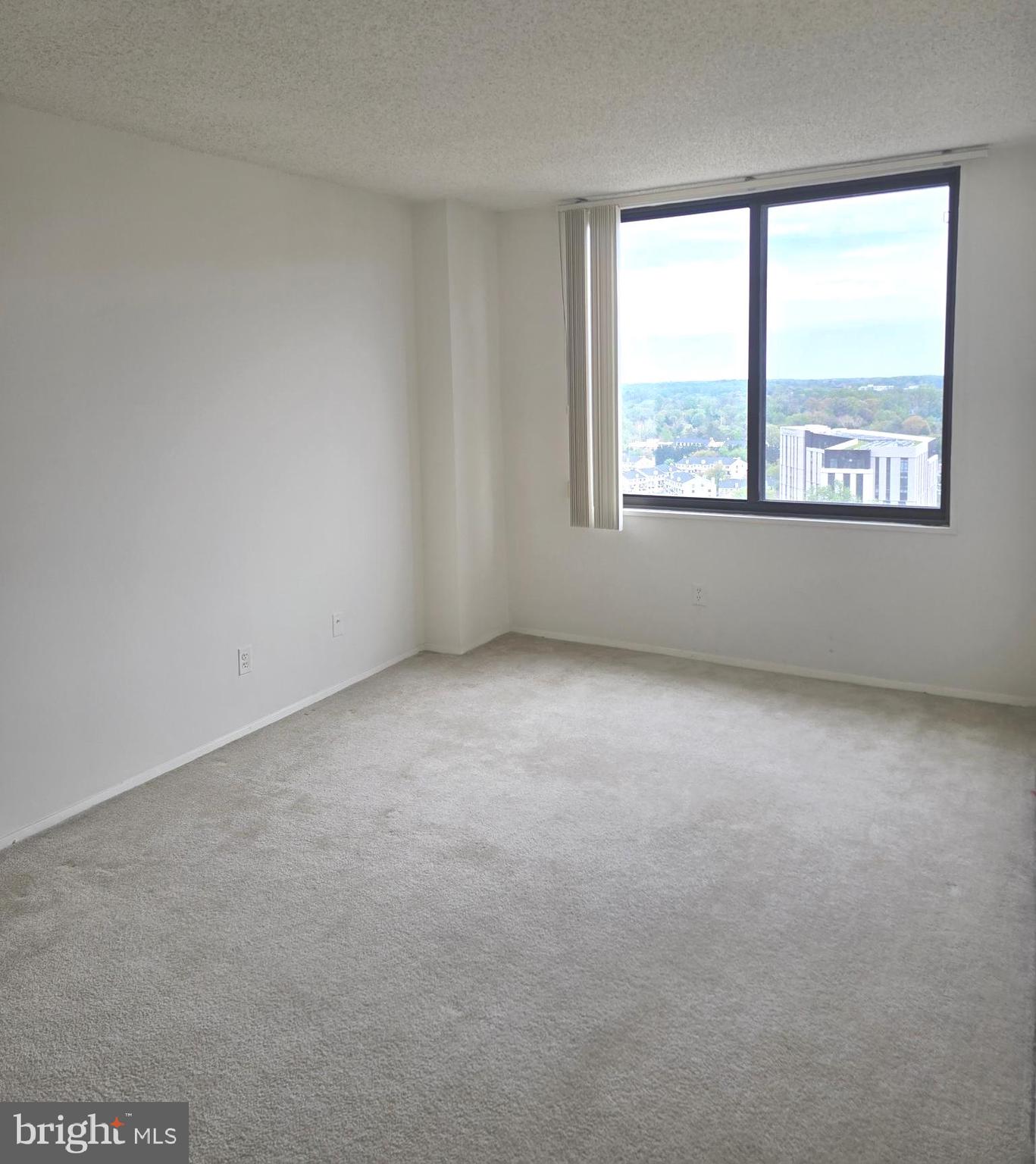5225 Pooks Hill Road, Unit 1814N Bethesda, MD 20814 - Photo 18 of 52 an empty room with a window