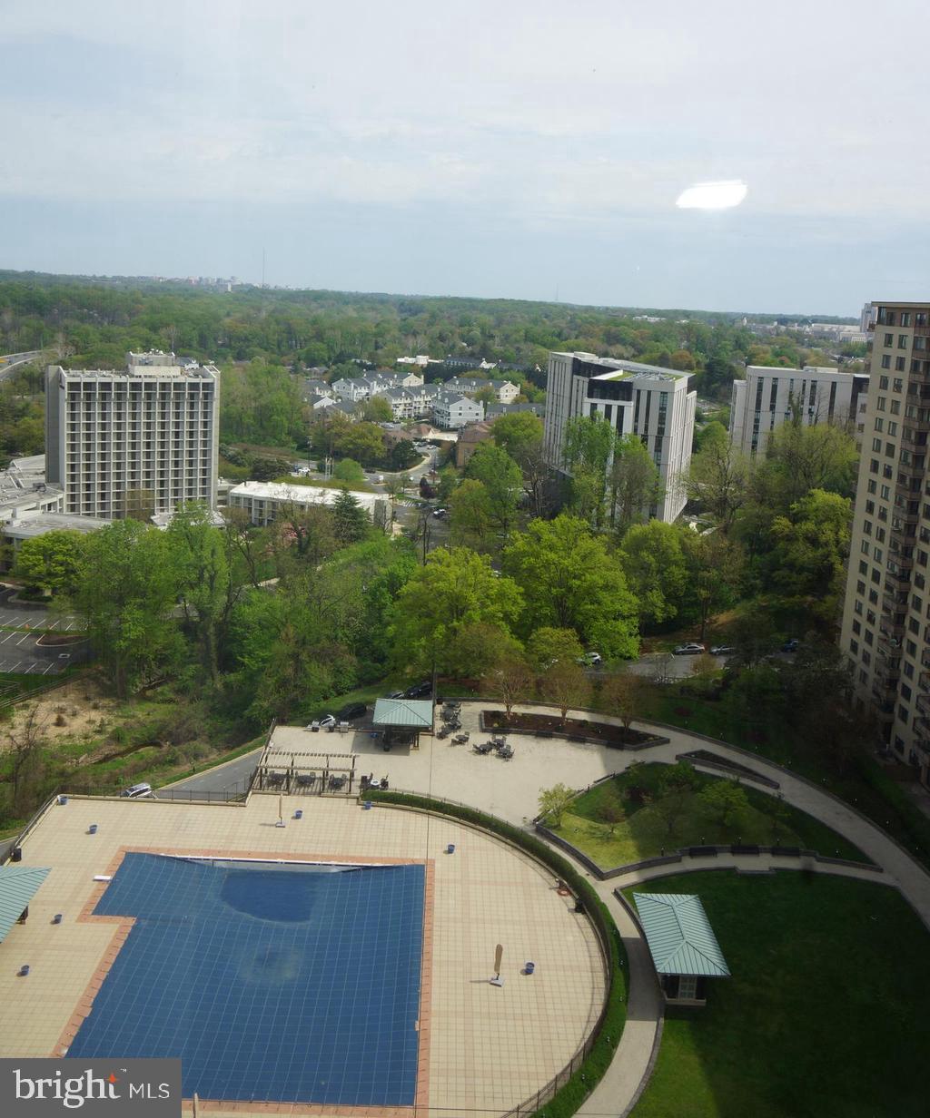 5225 Pooks Hill Road, Unit 1814N Bethesda, MD 20814 - Photo 19 of 52 a view of a swimming pool and a yard