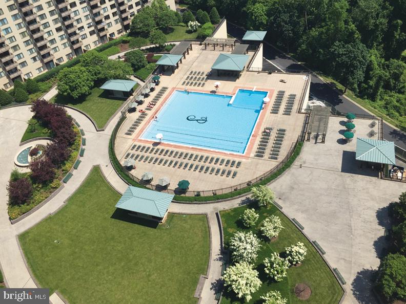 5225 Pooks Hill Road, Unit 1814N Bethesda, MD 20814 - Photo 46 of 52 an aerial view of a house with swimming pool and outdoor seating