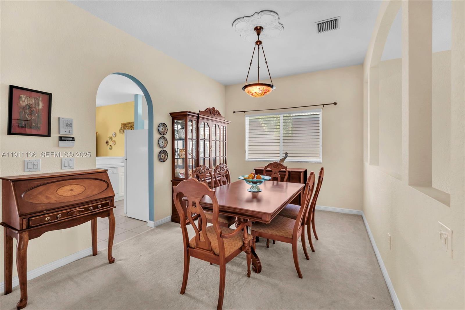 7921 Exeter Boulevard East, Unit 202 Tamarac, FL 33321 - Photo 15 of 55 a view of a livingroom with furniture