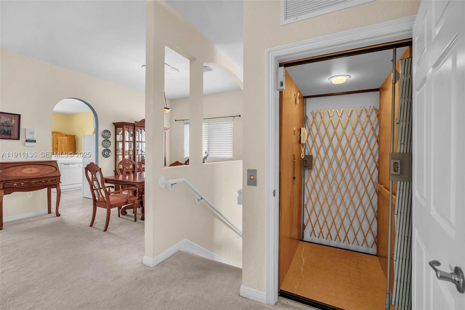 7921 Exeter Boulevard East, Unit 202 Tamarac, FL 33321 - Photo 21 of 55 a view of a livingroom with furniture and front door