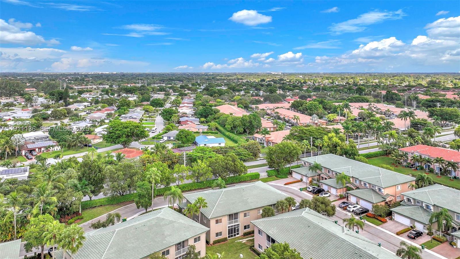 7921 Exeter Boulevard East, Unit 202 Tamarac, FL 33321 - Photo 37 of 55 an aerial view of a city
