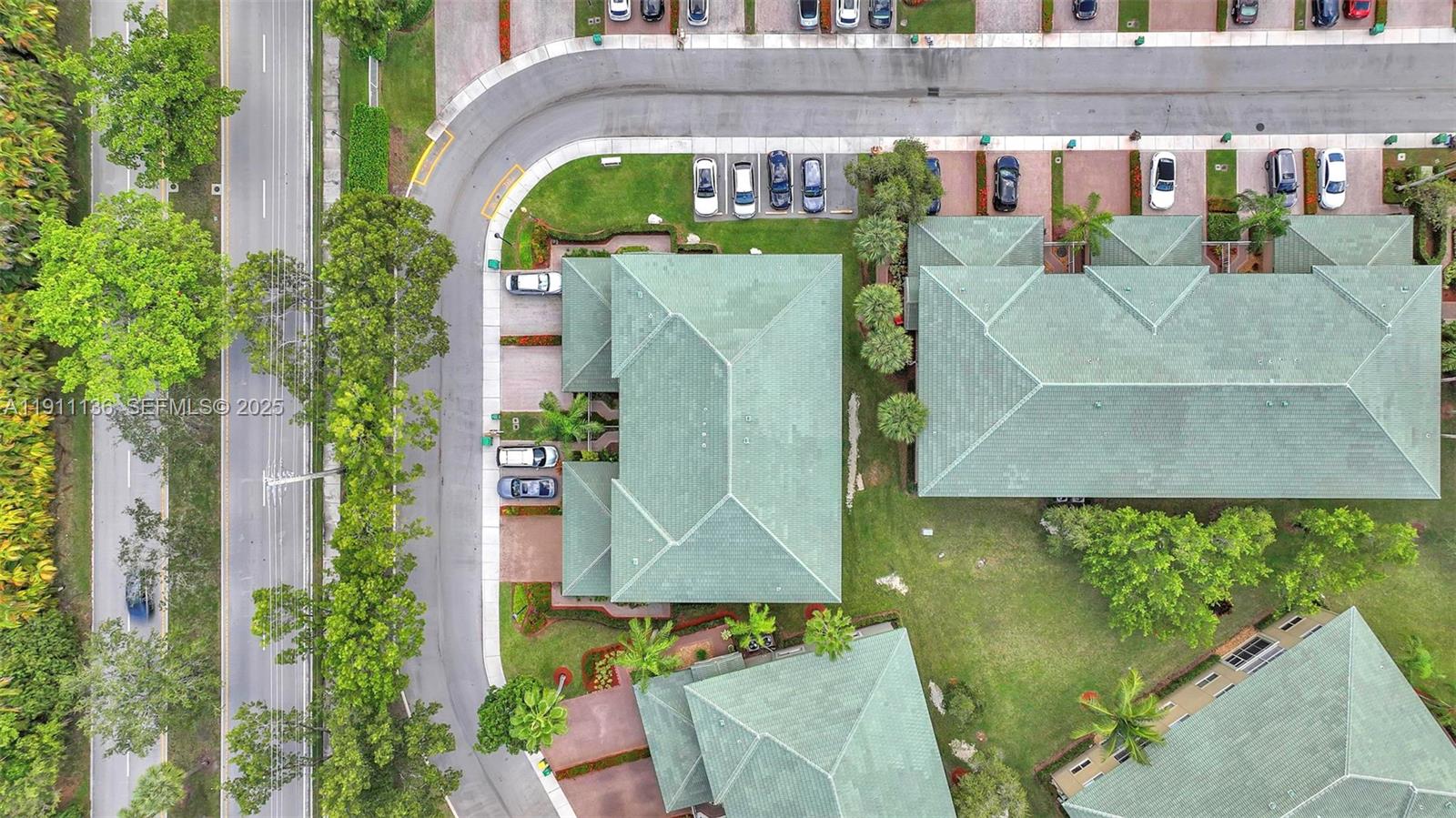 7921 Exeter Boulevard East, Unit 202 Tamarac, FL 33321 - Photo 51 of 55 an aerial view of a house with a garden