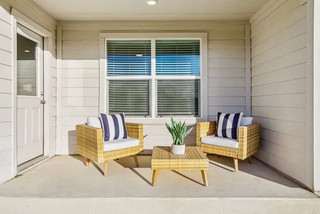 a view of a chairs in a patio