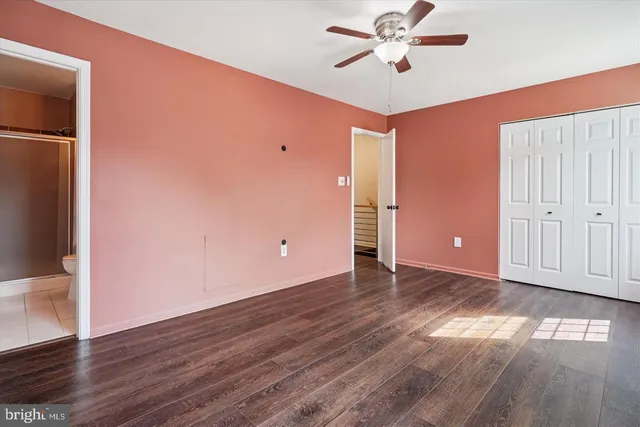 a view of a livingroom with wooden floor